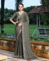 India Silk Grey Sarees Featuring Beautiful Rangoli Patterns Enhanced With Swarovski Work On The Saree And Border